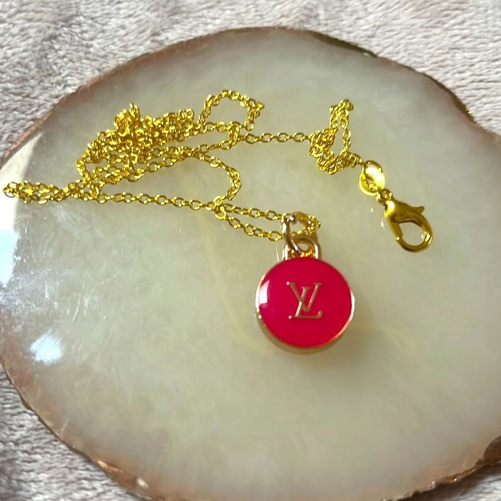 Repurposed Louis Vuitton charm into a necklace. Necklace is off market.
